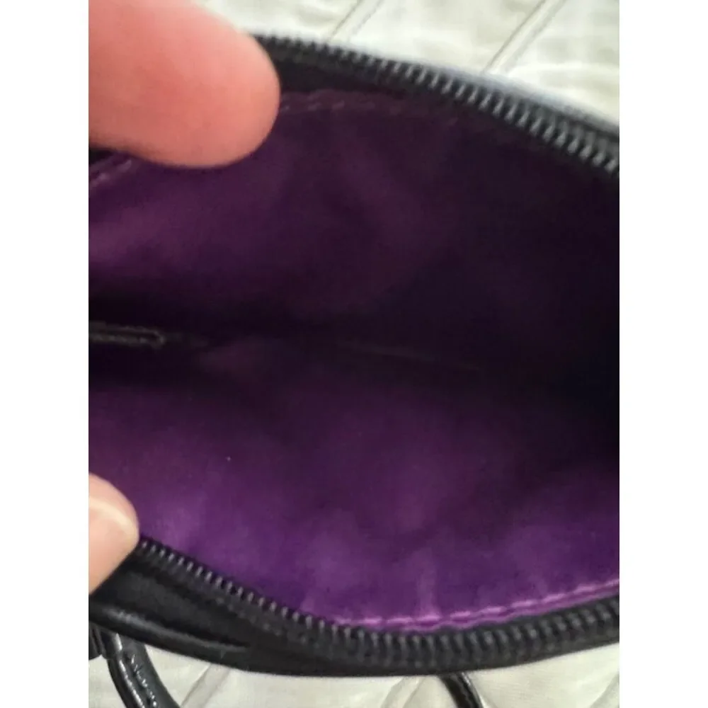 Coach Quilted wristlet, black.